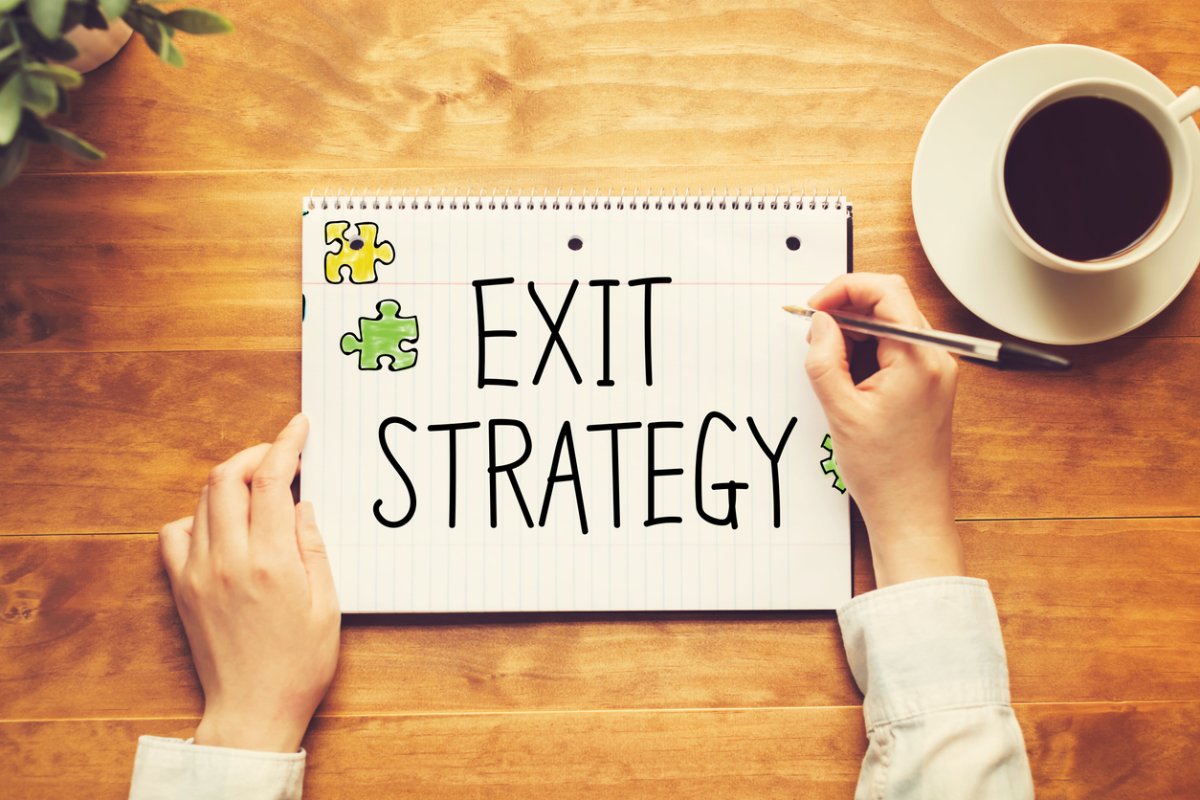 Could You Start Weaning Yourself Off Rightmove Today? 1 Exit Strategy text with a person holding a pen